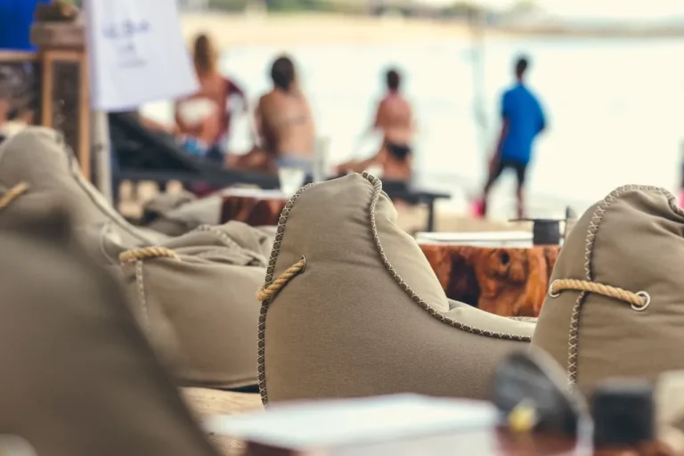 Beach club loungers facing the sea