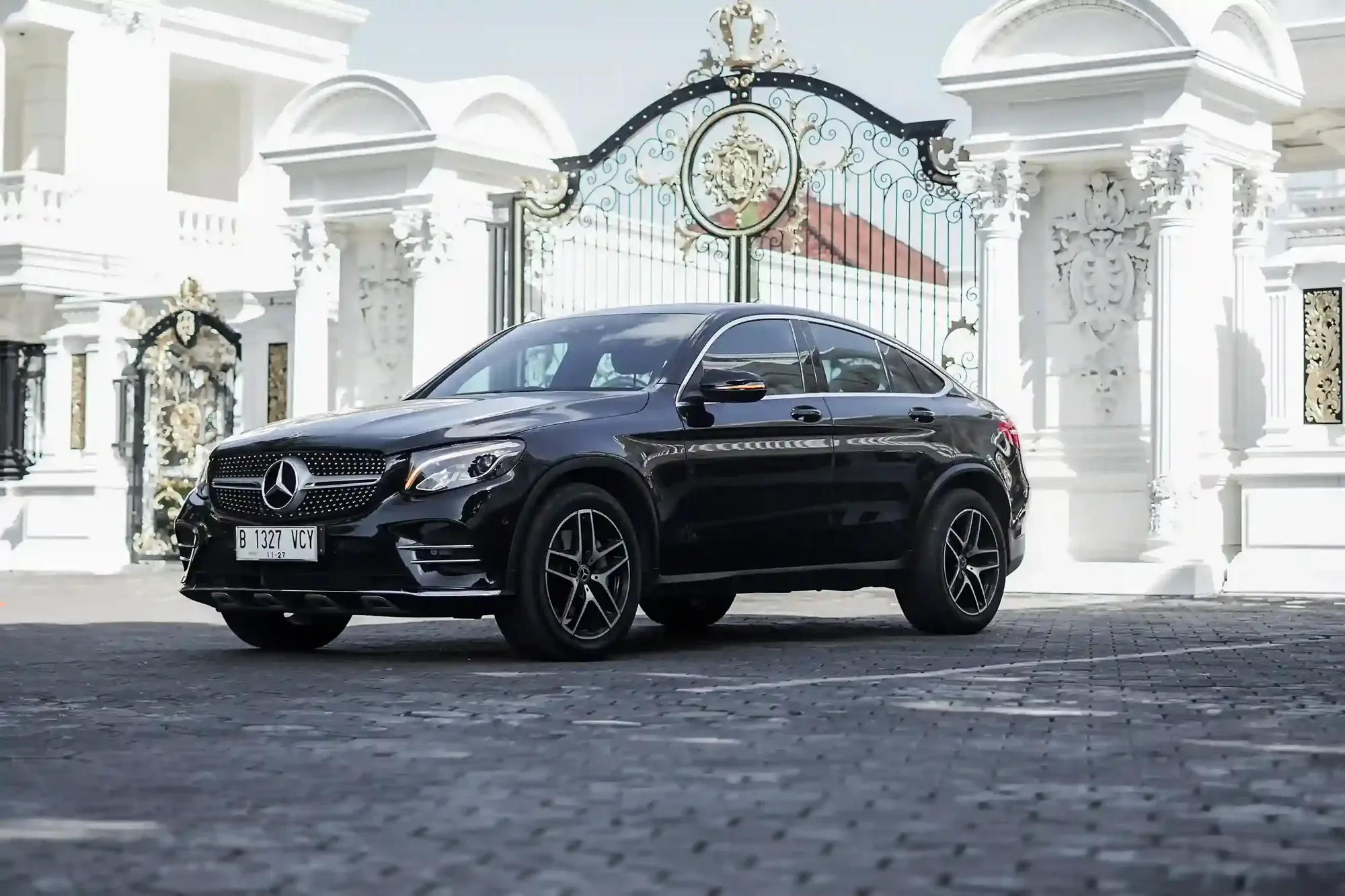 Black Mercedes-Benz GLC ready for a chauffeured transfer