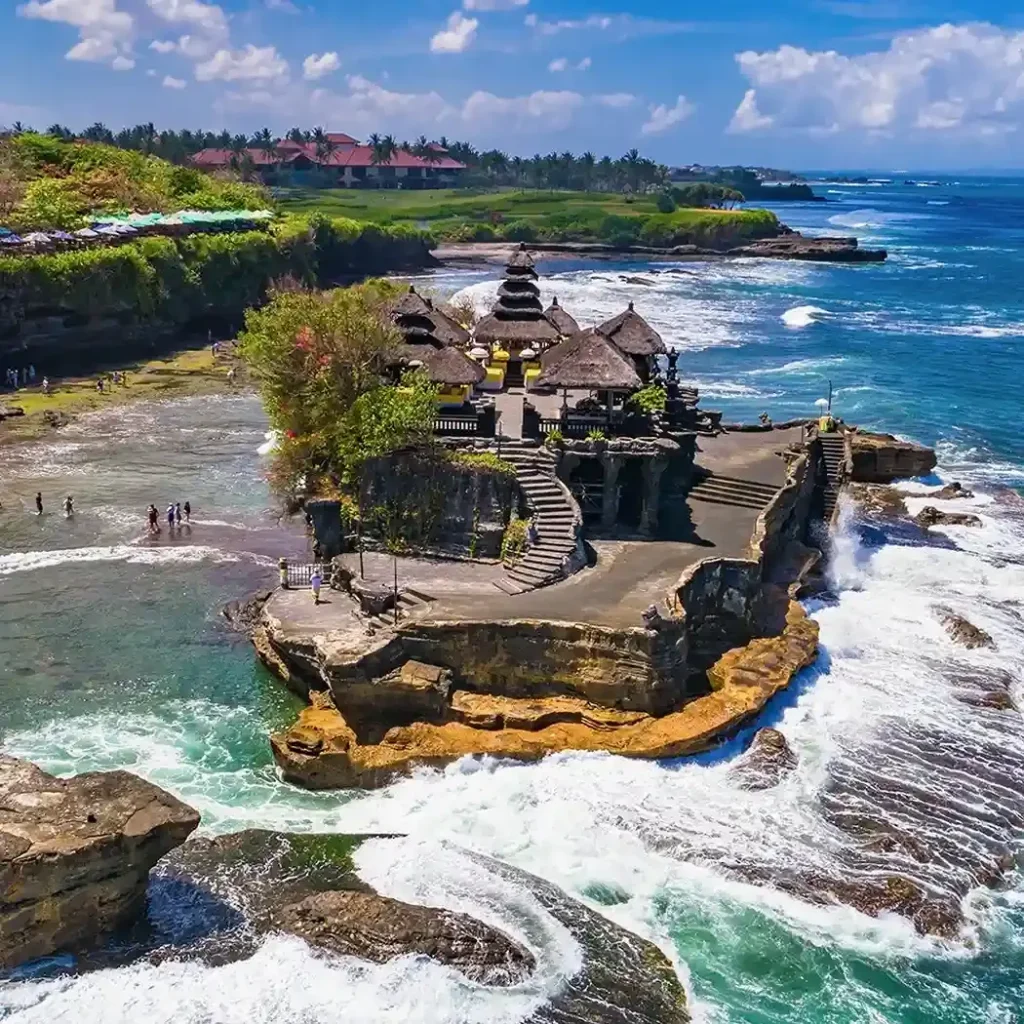 Aerial view of Tanah Lot temple from a helicopter tour
