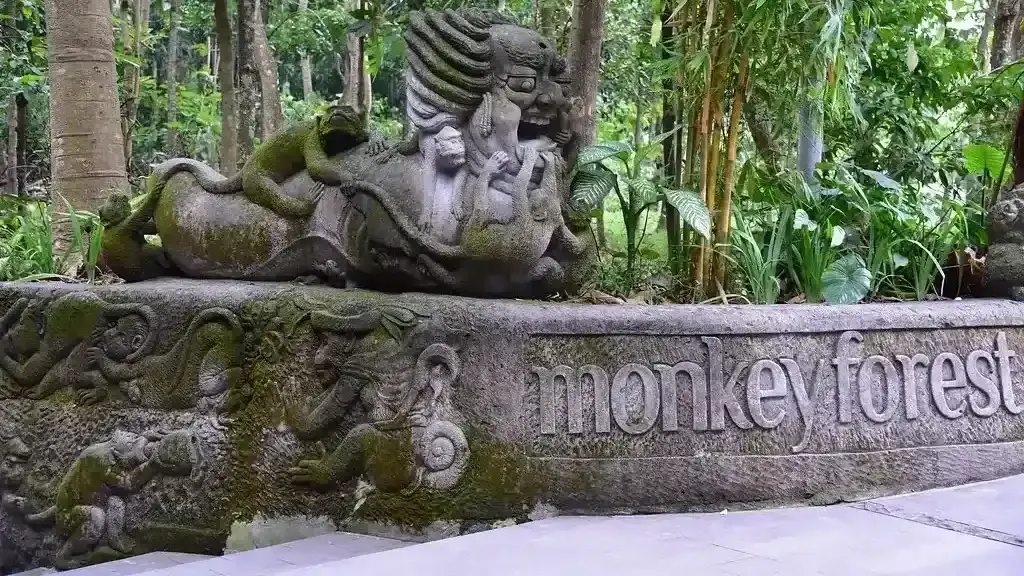 Mossy stone carvings in Ubud's Sacred Monkey Forest